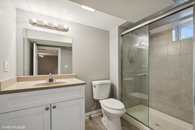 108 Yost Ave, Park Ridge, IL 60068 - bathroom with a stall shower, vanity, and tile patterned floors