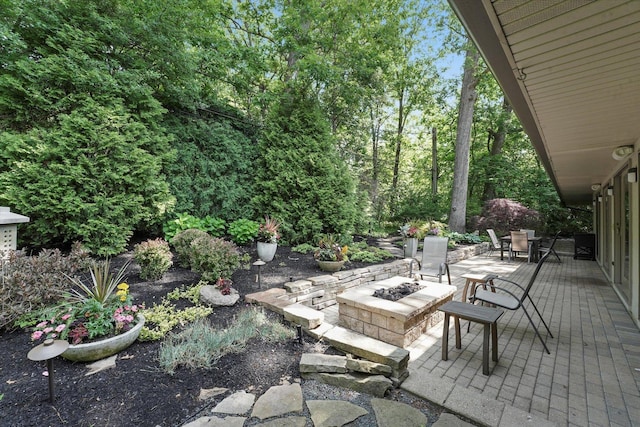 4770 Woodcliff Ln, Palatine, IL 60067 - view of patio / terrace with an outdoor fire pit and outdoor dining area