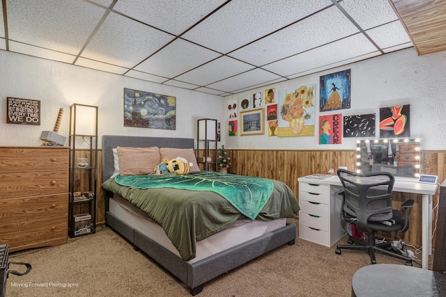 161 Olympic Dr, Bolingbrook, IL 60440 - carpeted bedroom featuring a paneled ceiling, a wainscoted wall, and wooden walls