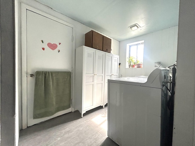 161 Olympic Dr, Bolingbrook, IL 60440 - laundry room with washer / dryer, cabinet space, and wood finished floors