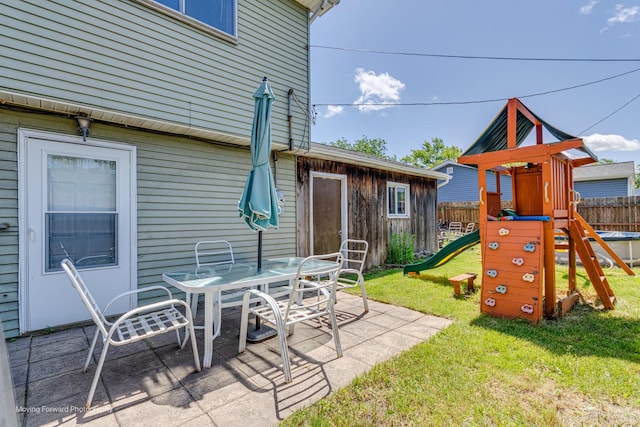 161 Olympic Dr, Bolingbrook, IL 60440 - view of patio / terrace with a playground and outdoor dining space