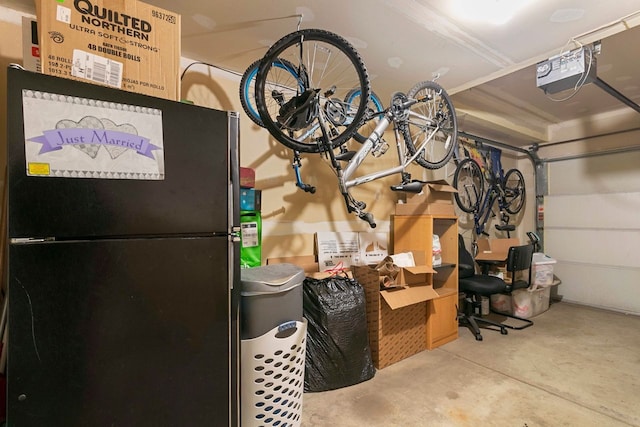 9207 E Prairie Rd, Evanston, IL 60203 - garage featuring a garage door opener and freestanding refrigerator
