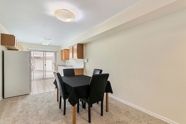 9207 E Prairie Rd, Evanston, IL 60203 - dining area with light colored carpet and baseboards