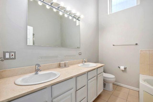 1217 N Greenview Ave Unit G, Chicago, IL 60642 - bathroom featuring double vanity, a bath, and tile patterned floors