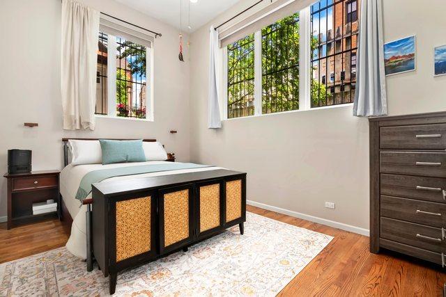 1217 N Greenview Ave Unit G, Chicago, IL 60642 - bedroom featuring wood finished floors and baseboards
