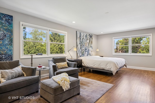 821 Sandstone Dr, Libertyville, IL 60048 - bedroom featuring hardwood / wood-style flooring, multiple windows, and recessed lighting