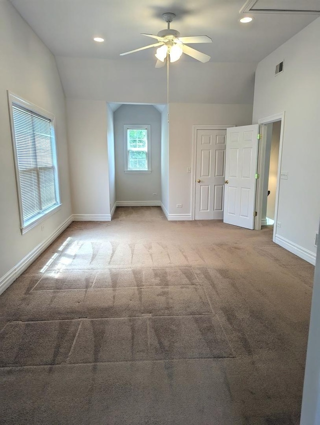 11360 195th St, Mokena, IL 60448 - empty room with vaulted ceiling, a ceiling fan, and carpet floors
