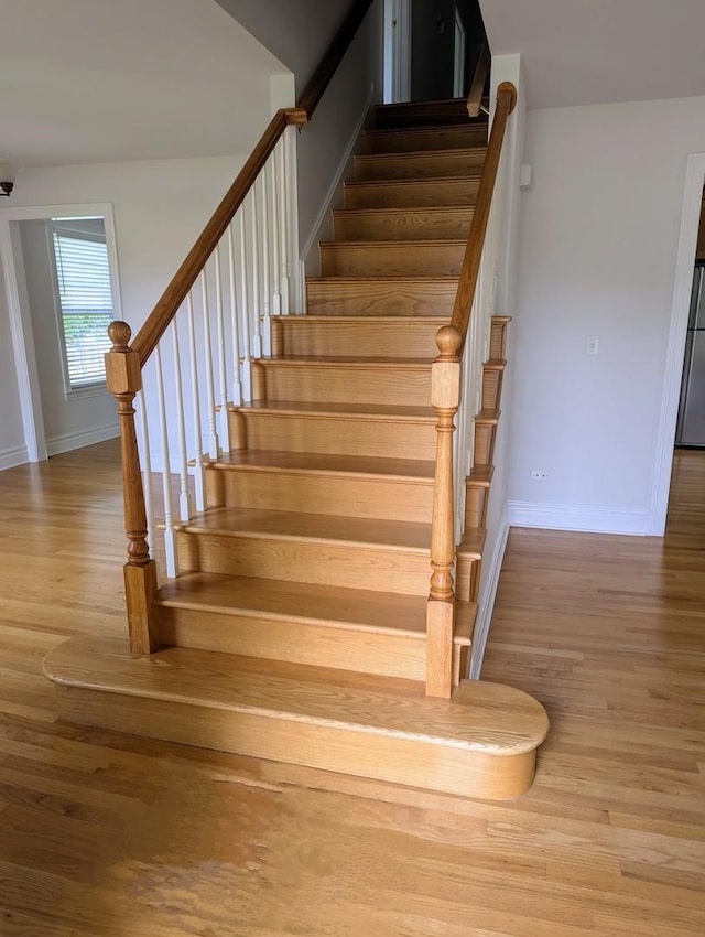 11360 195th St, Mokena, IL 60448 - staircase featuring wood finished floors and baseboards