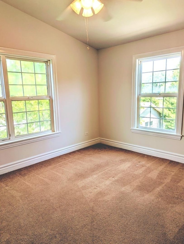 11360 195th St, Mokena, IL 60448 - empty room featuring carpet floors, a ceiling fan, and vaulted ceiling