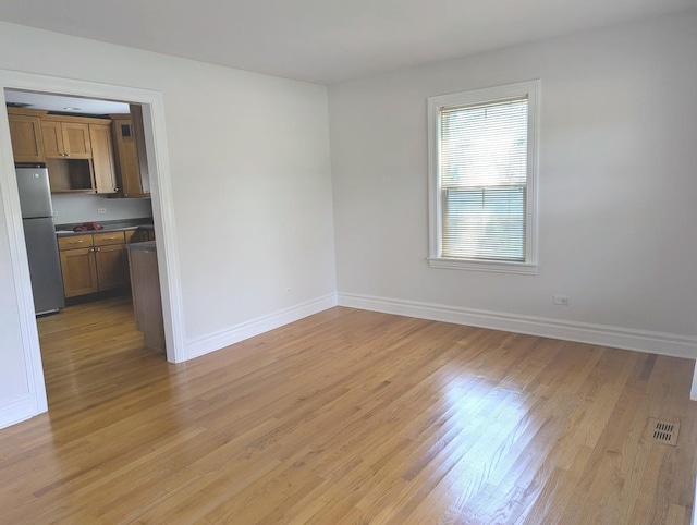 11360 195th St, Mokena, IL 60448 - unfurnished room with light wood-style floors and baseboards
