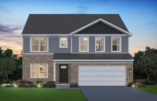 17225 Munster Ln, Tinley Park, IL 60477 - view of front facade featuring a yard, concrete driveway, a garage, and board and batten siding