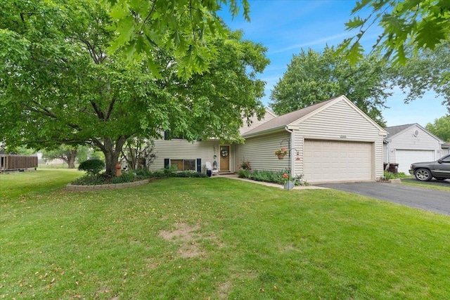 3583 Newport Dr, Island Lake, IL 60042 - view of front of property with a garage, asphalt driveway, and a front lawn