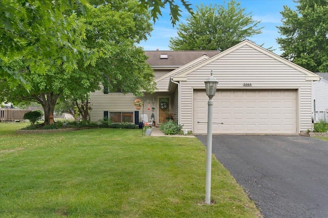 3583 Newport Dr, Island Lake, IL 60042 - view of front of property featuring asphalt driveway, an attached garage, and a front yard