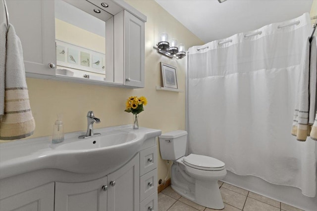 3583 Newport Dr, Island Lake, IL 60042 - bathroom featuring tile patterned flooring, vanity, and shower / bath combo with shower curtain