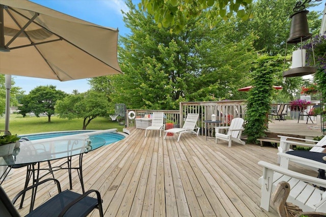 3583 Newport Dr, Island Lake, IL 60042 - wooden terrace featuring outdoor dining space, an outdoor pool, and a yard