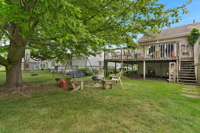 3583 Newport Dr, Island Lake, IL 60042 - view of yard with stairs, a deck, and an outdoor fire pit