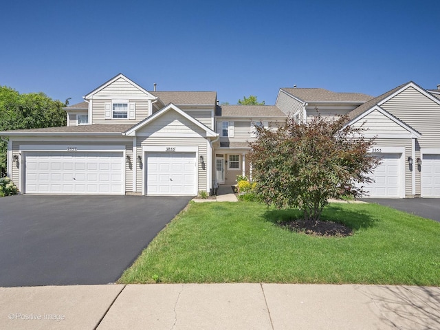 2855 Vernal Ln, Naperville, IL 60564 - multi unit property featuring driveway, a front yard, and a garage