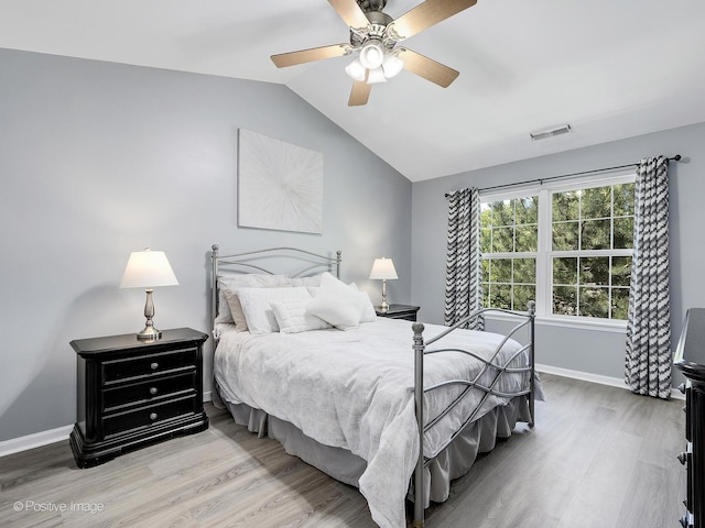 2855 Vernal Ln, Naperville, IL 60564 - bedroom with lofted ceiling, wood finished floors, and a ceiling fan