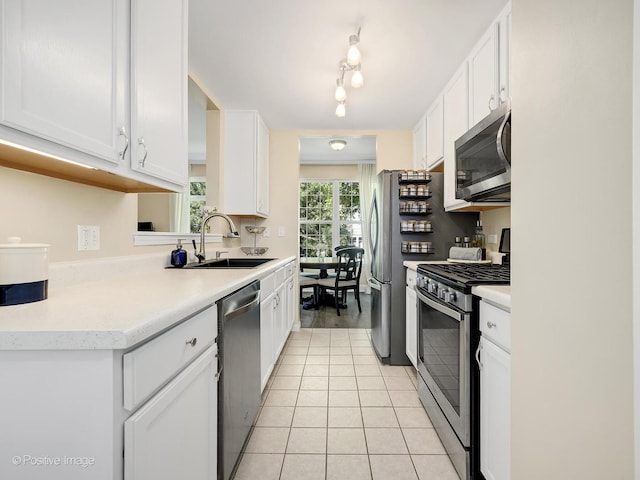 2855 Vernal Ln, Naperville, IL 60564 - kitchen featuring stainless steel appliances, white cabinets, light tile patterned flooring, and light countertops
