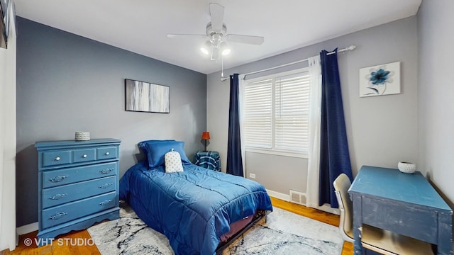 7525 N Overhill Ave, Chicago, IL 60631 - bedroom with wood finished floors and a ceiling fan