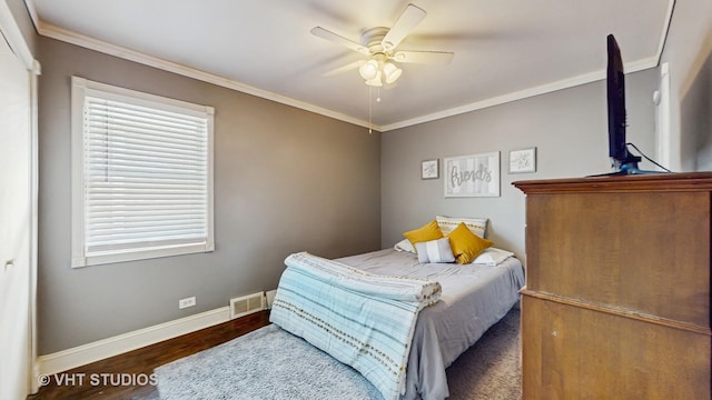 7525 N Overhill Ave, Chicago, IL 60631 - bedroom featuring ornamental molding, wood finished floors, and a ceiling fan