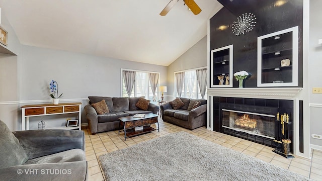 7525 N Overhill Ave, Chicago, IL 60631 - tiled living room with a ceiling fan, a fireplace, and high vaulted ceiling