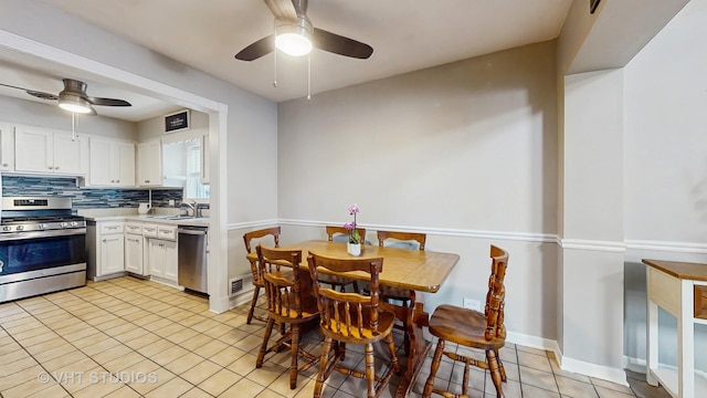 7525 N Overhill Ave, Chicago, IL 60631 - dining space with a ceiling fan and light tile patterned flooring