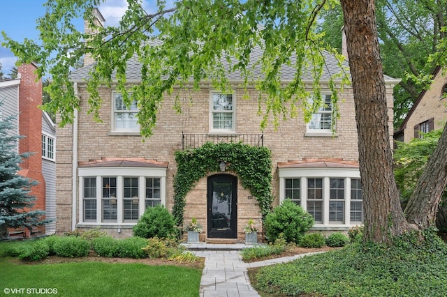 2010 Beechwood Ave, Wilmette, IL 60091 - view of front facade featuring roof with shingles and brick siding