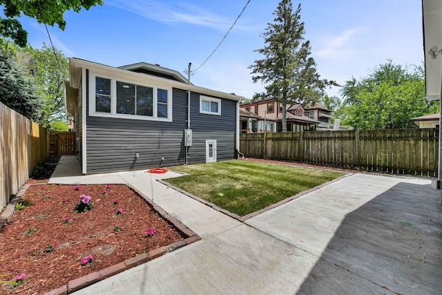 1115 N Taylor Ave, Oak Park, IL 60302 - back of house featuring a fenced backyard and a patio