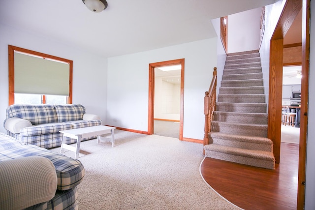 382 Keigwin Rd, Walnut, IL 61376 - living area featuring stairs and carpet