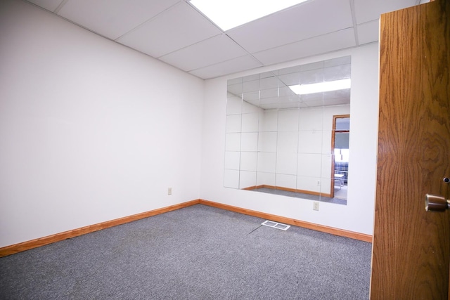 382 Keigwin Rd, Walnut, IL 61376 - empty room featuring a drop ceiling and carpet flooring