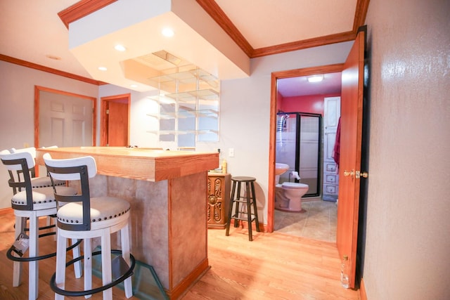 382 Keigwin Rd, Walnut, IL 61376 - indoor bar featuring crown molding and light wood finished floors