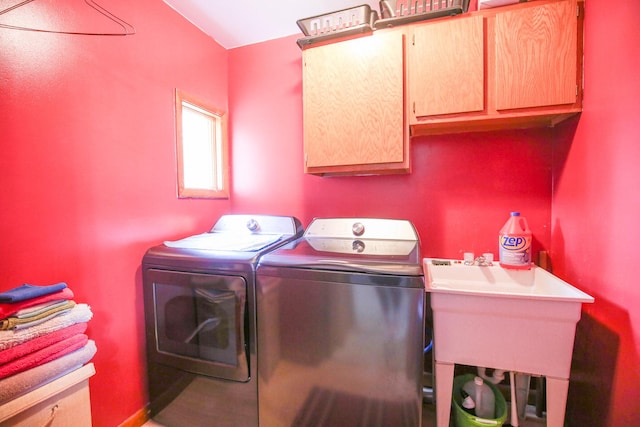 382 Keigwin Rd, Walnut, IL 61376 - laundry room featuring cabinet space and washer and clothes dryer