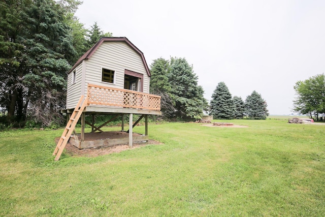 382 Keigwin Rd, Walnut, IL 61376 - view of green lawn featuring a wooden deck