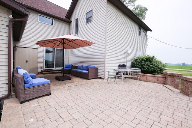 382 Keigwin Rd, Walnut, IL 61376 - view of patio featuring an outdoor living space