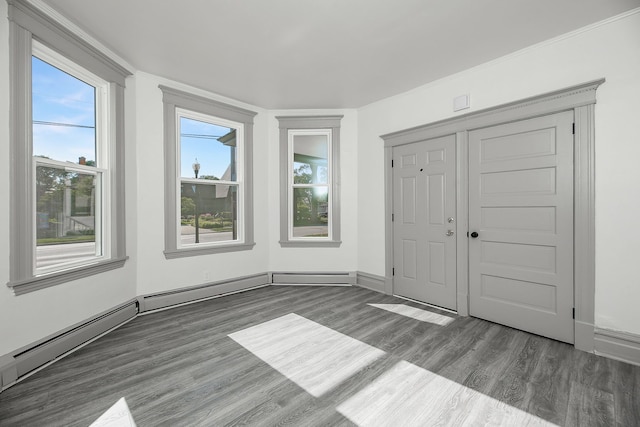 123 N W St, Wheaton, IL 60187 - entrance foyer with wood finished floors and a baseboard radiator