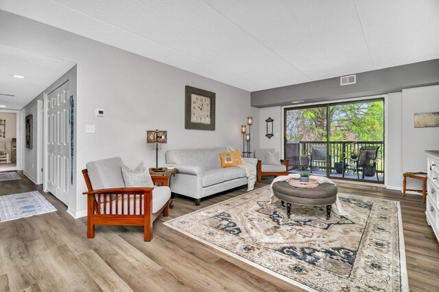 1422 Woodbridge Rd Unit 2E, Joliet, IL 60436 - living area featuring wood finished floors