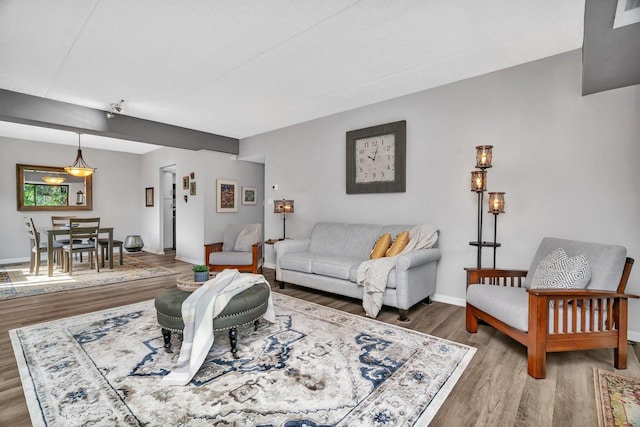 1422 Woodbridge Rd Unit 2E, Joliet, IL 60436 - living area featuring wood finished floors and baseboards