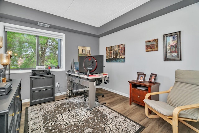 1422 Woodbridge Rd Unit 2E, Joliet, IL 60436 - office featuring wood finished floors and a textured ceiling