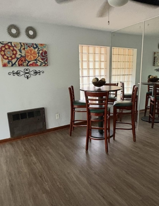1205 N Harlem Ave Unit 6, Oak Park, IL 60302 - dining area with ceiling fan, wood finished floors, and a fireplace