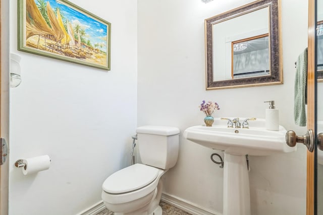 817 Hibbard Rd Unit D, Wilmette, IL 60091 - bathroom featuring toilet and baseboards