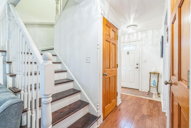 817 Hibbard Rd Unit D, Wilmette, IL 60091 - foyer entrance featuring light wood-style flooring and stairway