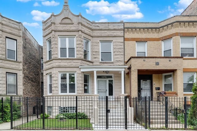 4047 W Adams St, Chicago, IL 60624 - multi unit property featuring a fenced front yard and a gate