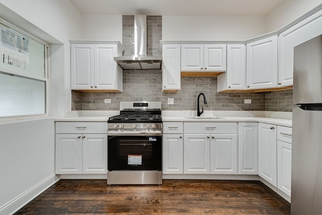 4047 W Adams St, Chicago, IL 60624 - kitchen with stainless steel appliances, wall chimney exhaust hood, light countertops, backsplash, and white cabinets