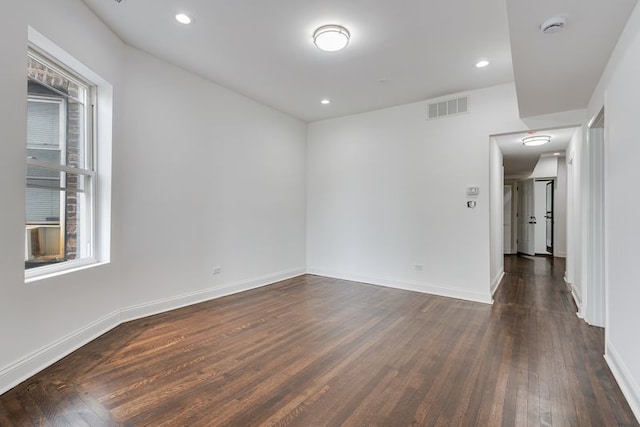 4047 W Adams St, Chicago, IL 60624 - empty room featuring dark wood-type flooring, a smoke detector, and recessed lighting