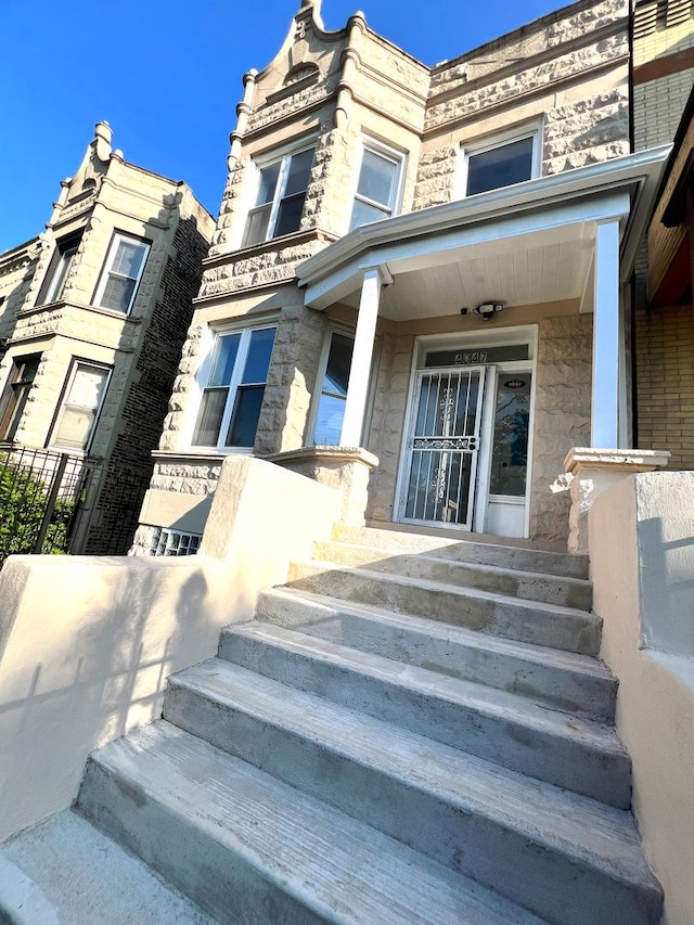 4047 W Adams St, Chicago, IL 60624 - entrance to property with stone siding and covered porch