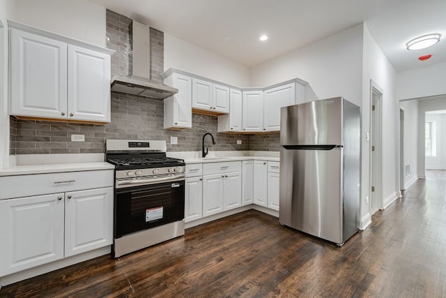 4047 W Adams St, Chicago, IL 60624 - kitchen with appliances with stainless steel finishes, wall chimney exhaust hood, dark wood finished floors, light countertops, and decorative backsplash