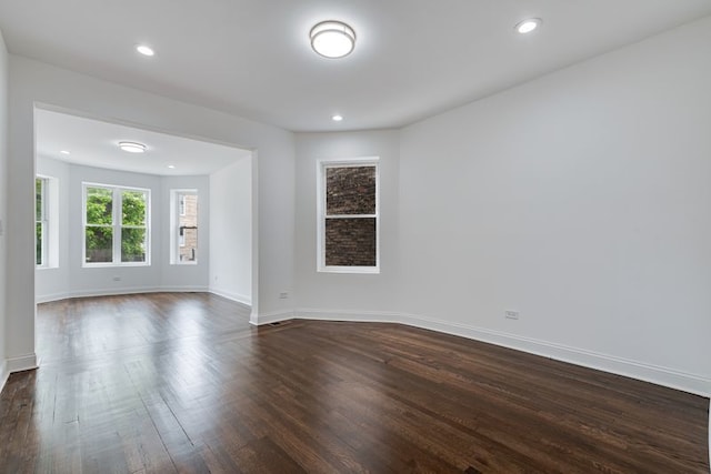 4047 W Adams St, Chicago, IL 60624 - empty room with dark wood finished floors and recessed lighting