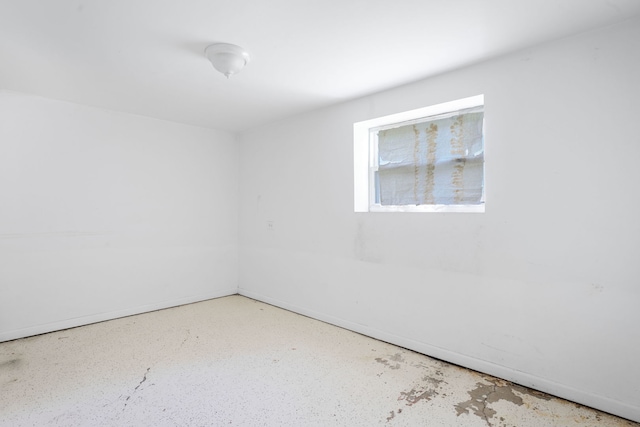 7545 S Ridgeland Ave, Chicago, IL 60649 - spare room with concrete floors and baseboards