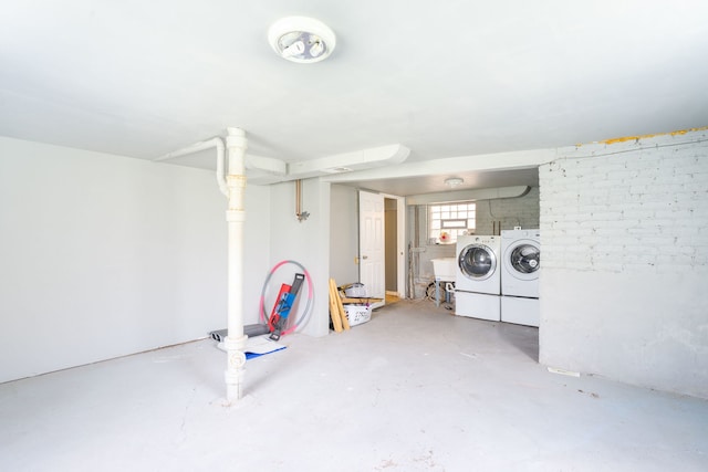 7545 S Ridgeland Ave, Chicago, IL 60649 - basement with washer and clothes dryer and a sink